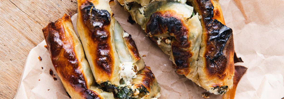 Spinach and Feta Börek Recipe - Gozney - Outdoor oven recipe poster image