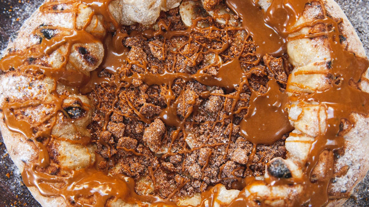 Pizza covered in chocolate recipe poster image