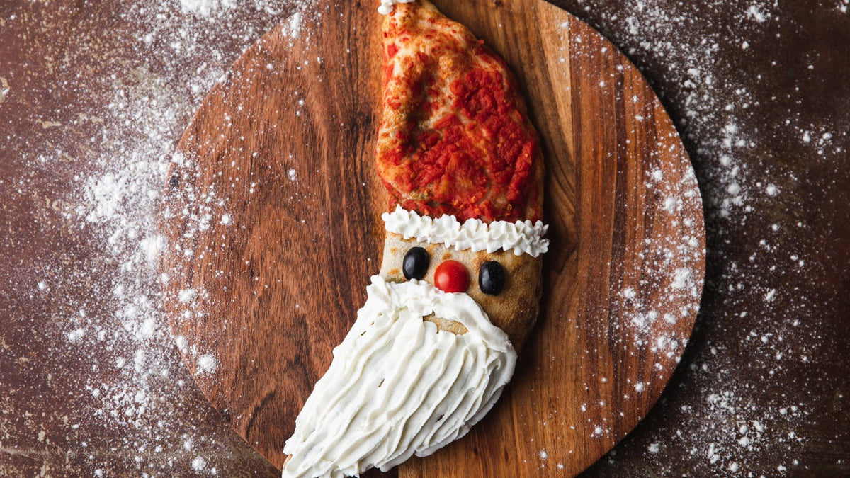 Christmas Calzone with red hat and white beard recipe poster image
