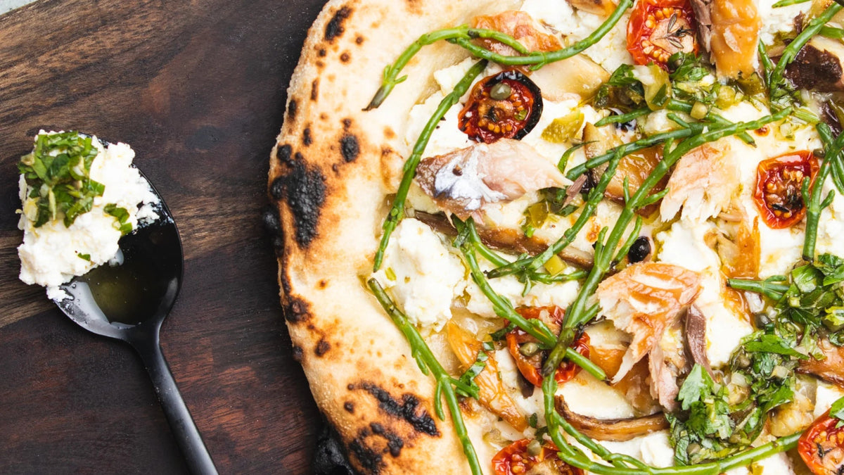 Smoked Mackerel, Sun-blushed Tomato, Samphire & Salsa Verdi Pizza recipe poster image